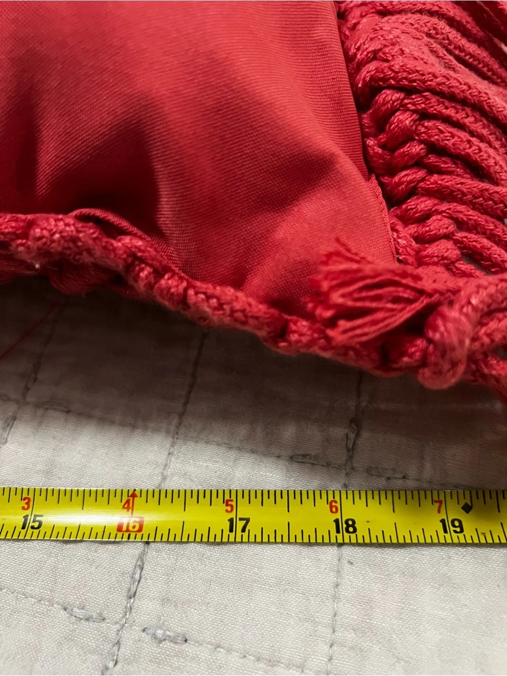 Textured macrame coral pillow